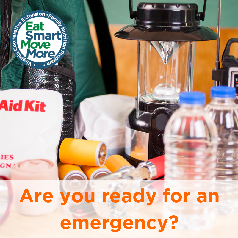 emergency kit with water bottles, lantern, batteries, first aid kit and backpack