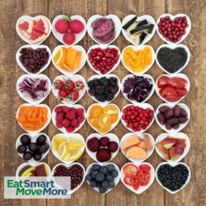 heart-shaped dishes of different colorful fruits, vegetables, beans, and grains